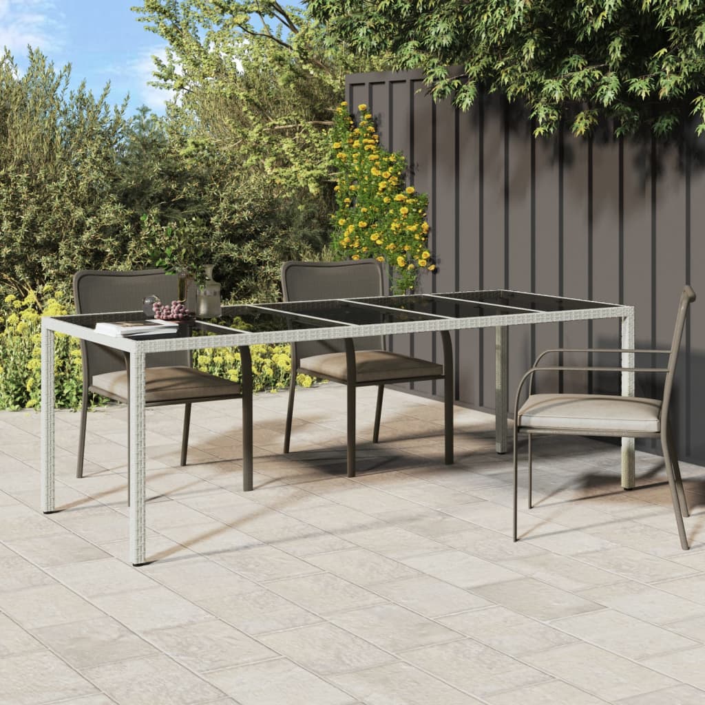 Table de jardin 250x100x75 cm verre trempé et poly rotin